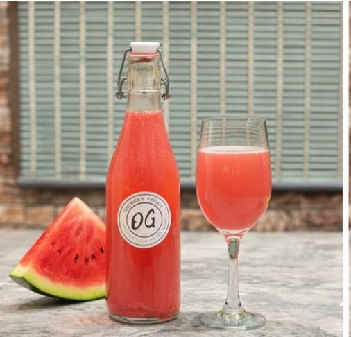 Watermelon ginger bug soda in a swing-top bottle